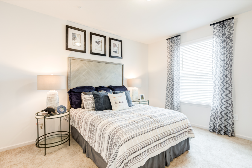 Interior photograph of an apartment unit bedroom