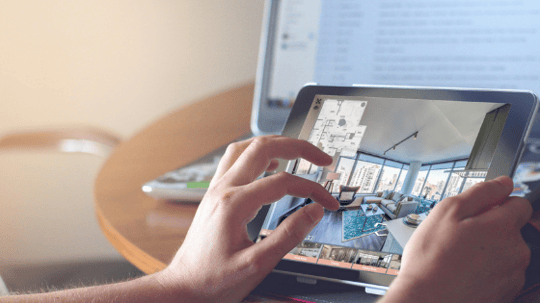 Person on iPad - Panoskin Virtual Tour