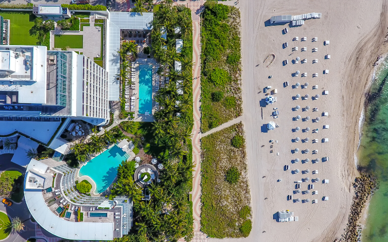 Professional drone photography of a hotel with beach access